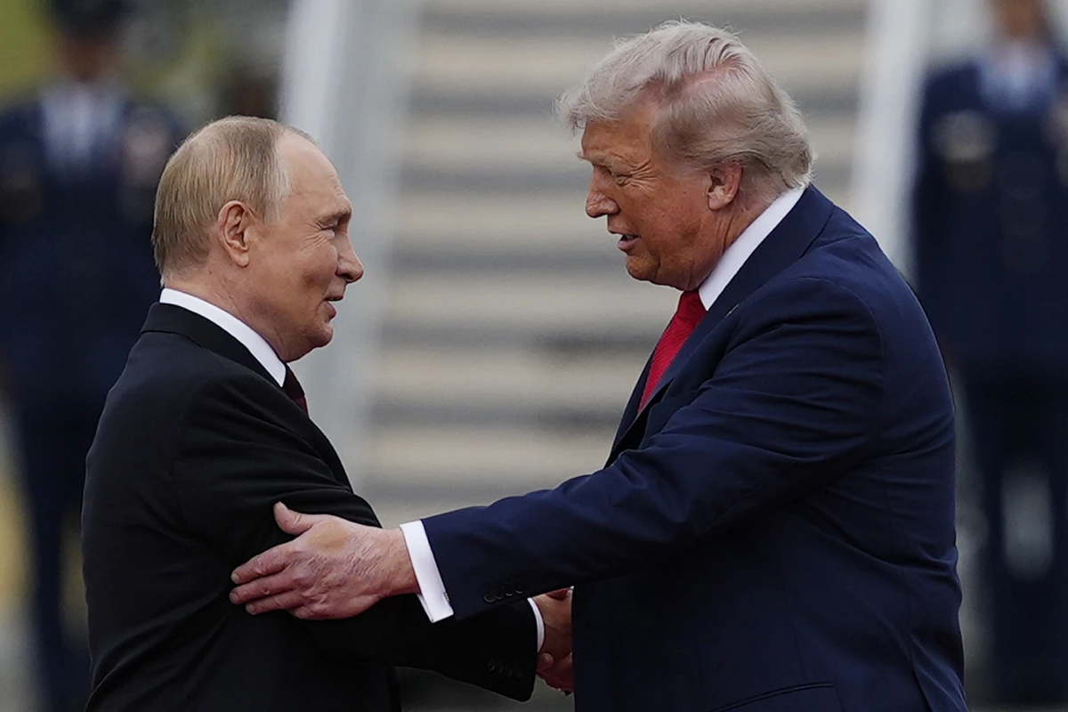 President Trump greets Russia's President Vladimir Putin on Aug. 15 at Joint Base Elmendorf-Richardson, Alaska.