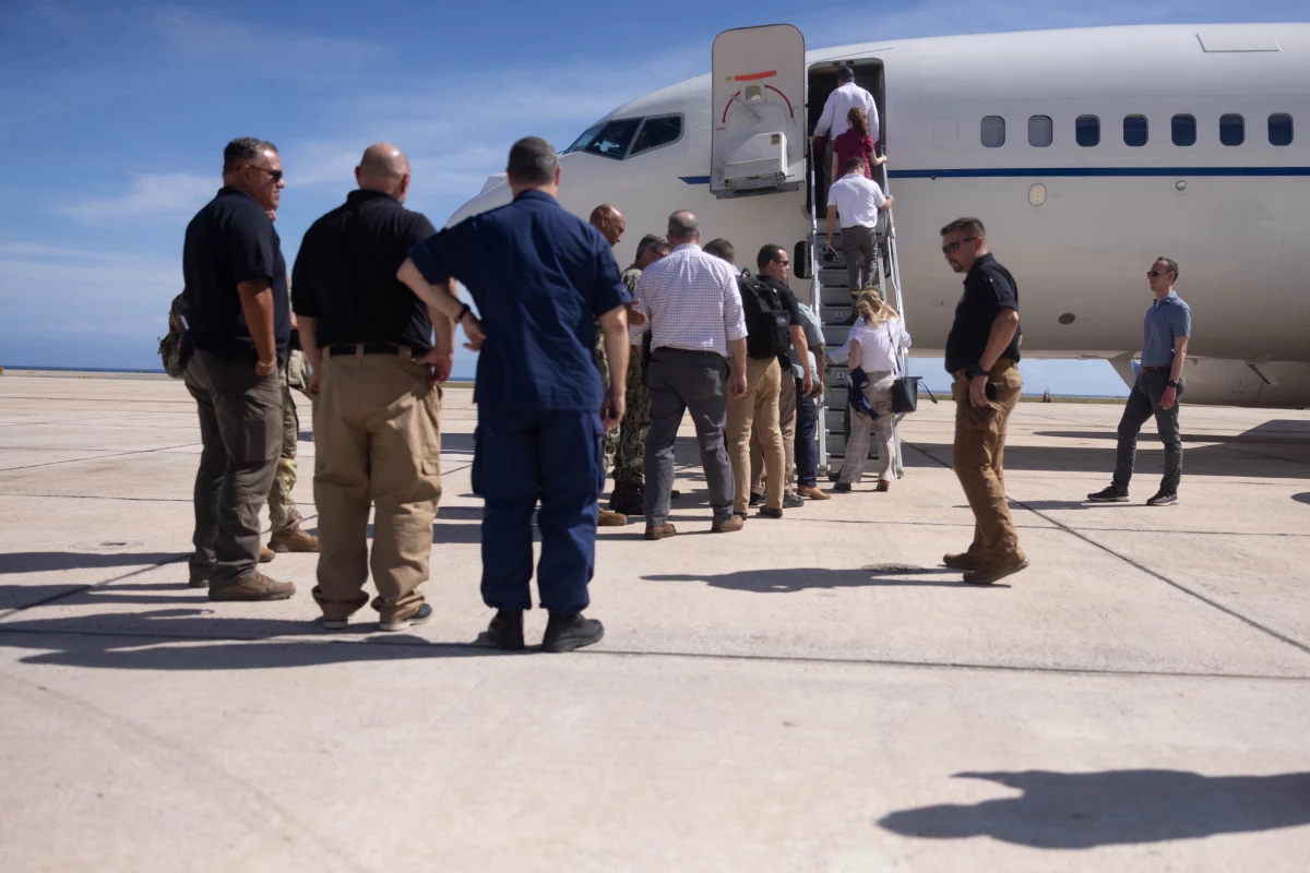 Members of a congressional delegation depart after touring Guantánamo in March. Sen. Gary Peters, D-Mich., said afterwards, 'on the day that I visited, there were 87 people in custody. My understanding is that's a pretty normal number.'