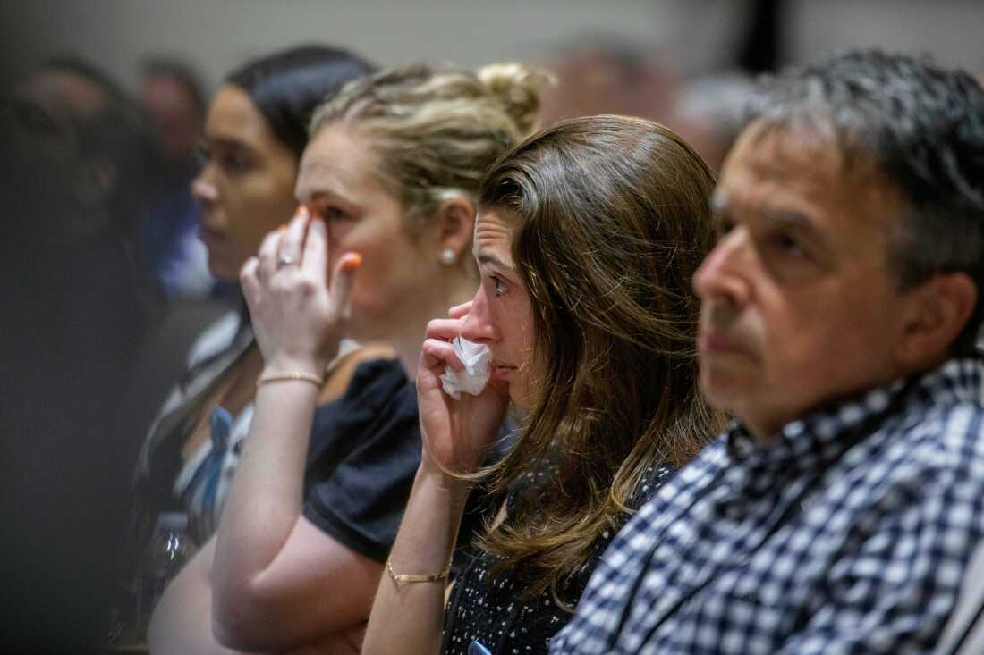 Family members of the victims of American Airlines flight 5342 listen to opening statements during the National Transportation Safety Board investigative hearing in Washington on Wednesday.