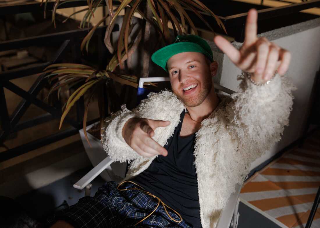 Niklaus Miller, 29, is photographed in his balcony in Los Angeles wearing the outfit for his Bad Bunny audition. Not a native Spanish speaker, Miller committed to learning all of Bad Bunny’s lyrics after the artist was announced as the Super Bowl halftime performer and has since gained a large social media following while preparing an audition in hopes of making it to the show.