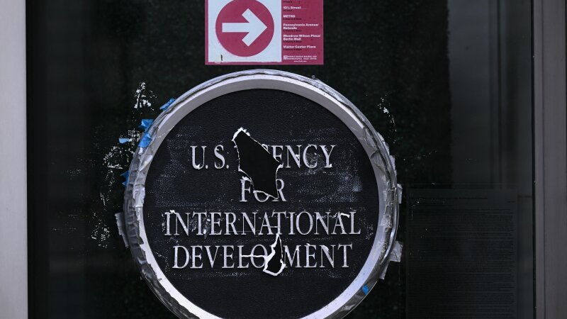 Remnants of signage for the US Agency for International Development (USAID) on the facade of the Ronald Reagan Building and International Trade Center building in Washington, DC, on December 29, 2025.