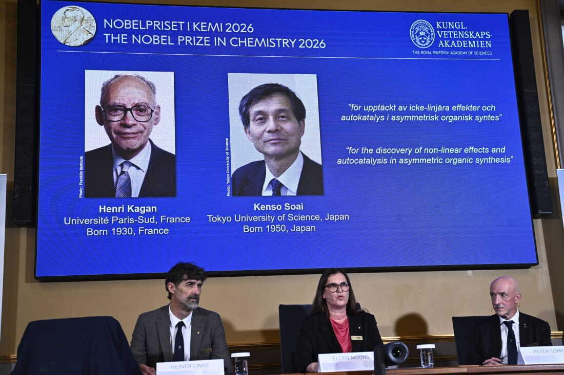 Portraits of Henri Kagan and Kenso Soai are shown on the screen as they are awarded the 2026 Nobel Prize in Chemistry, at the Royal Swedish Academy of Sciences in Stockholm, Sweden, on Oct. 7, 2026.