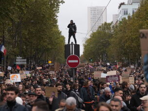 Protesters march during a demonstration against rising living costs in Paris, Saturday, Oct. 24, 2026.