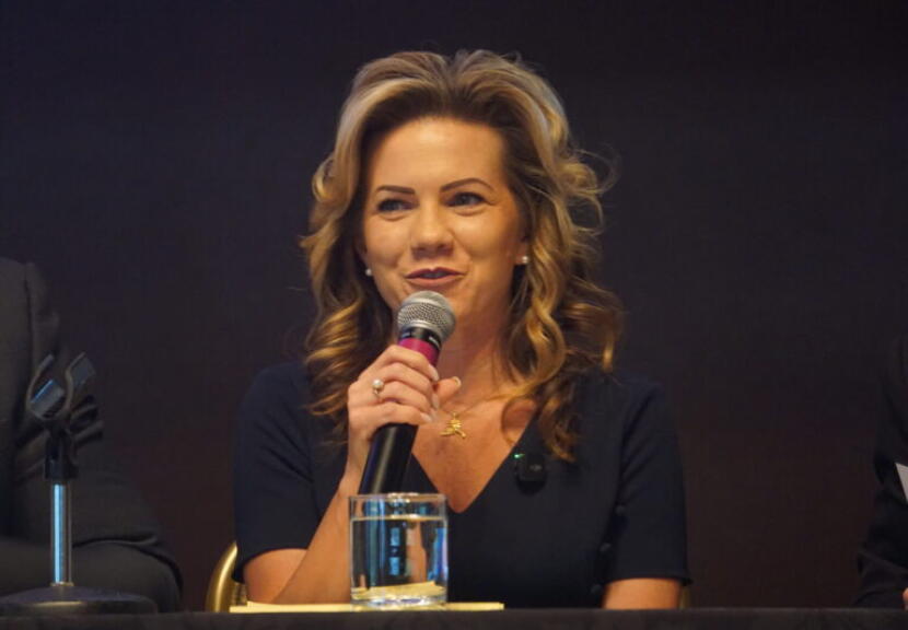 Anchorage business owner and talk-show host Bernadette Wilson, a Republican, speaks at a gubernatorial candidate forum held in Girdwood on Sept. 16, 2026, by the Alaska Hospital and Healthcare Association.