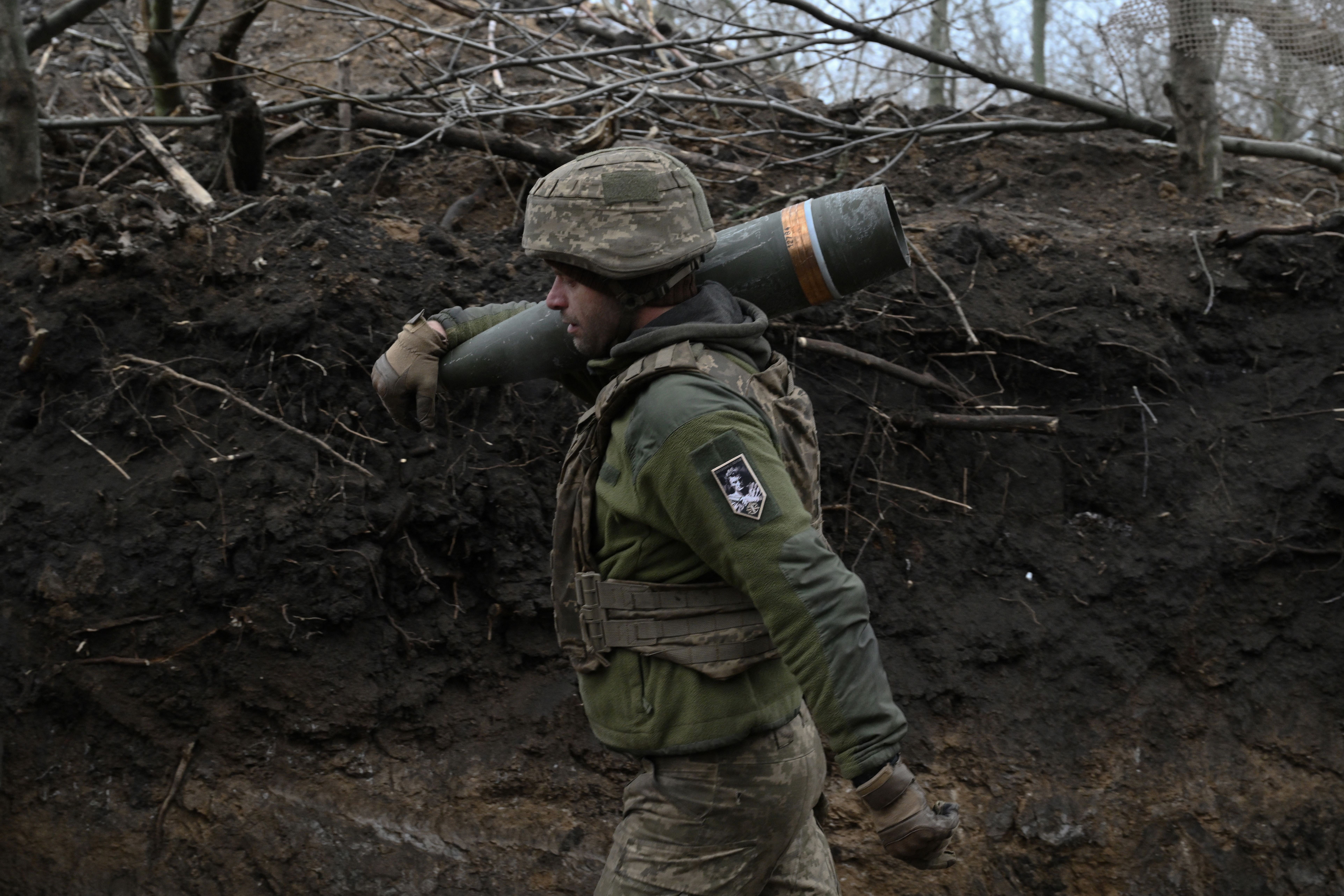 An artilleryman of the Ukrainian armed forces prepares to fire a French-made Caesar self-propelled howitzer toward Russian positions in the Donetsk region on Jan. 6.