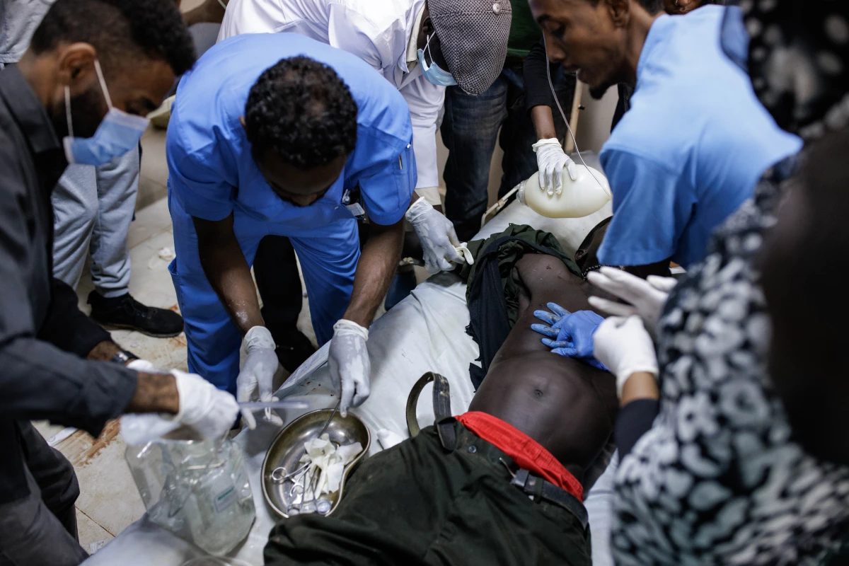 Doctors attempt to resuscitate a victim of shelling at the Al-Nao Hospital in Omdurman, Sudan, on Sept. 5. The victim was later announced dead.