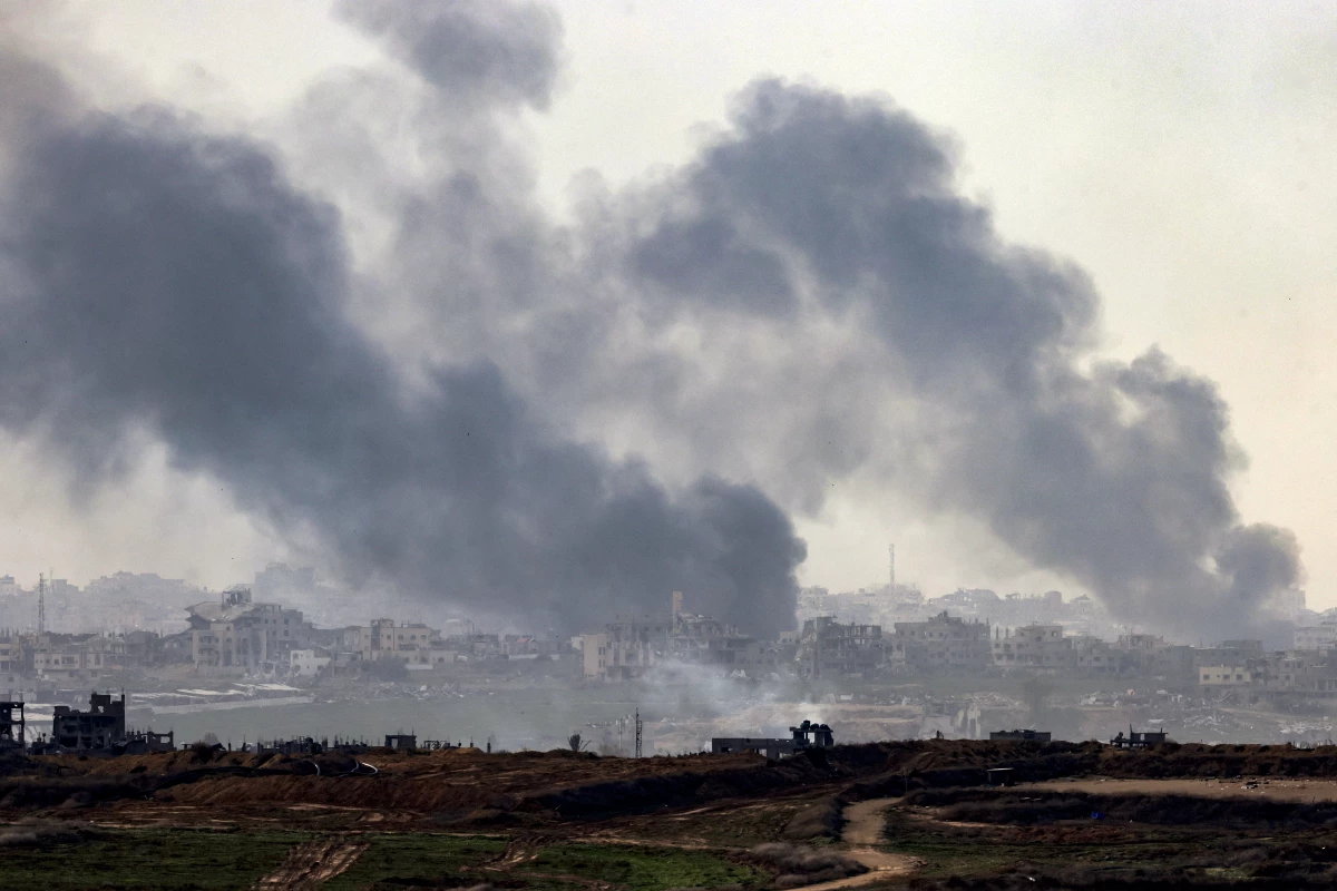 A view from the southern Israeli city of Sderot shows smoke rising above destroyed buildings in the northern Gaza Strip during an Israeli army bombardment on Jan. 5.