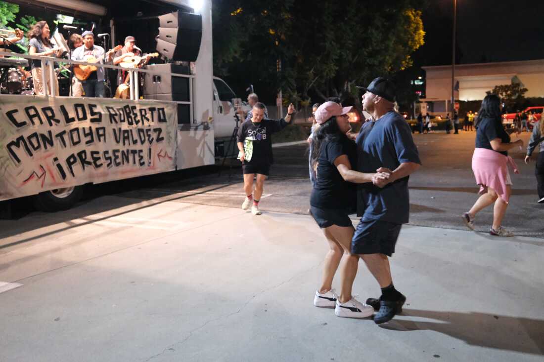 In October dancing at the memorial of a day laborer who was hit by a car while trying to avoid arrest by immigration agents.