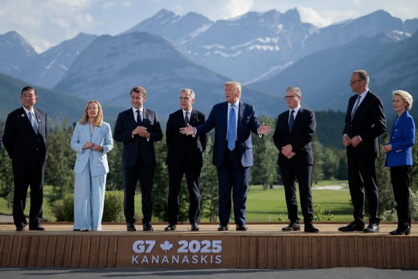 President Trump talks to reporters on June 16, 2025, in Kananaskis, Alberta, Canada, during a 'family photo with G7 leaders (L-R) Japanese Prime Minister Shigeru Ishiba, Italian Prime Minister Giorgia Meloni, French President Emmanuel Macron, Canadian Prime Minister Mark Carney, Trump, British Prime Minister Keir Starmer, German Chancellor Friedrich Merz, and European Union Commission President Ursula von der Leyen.