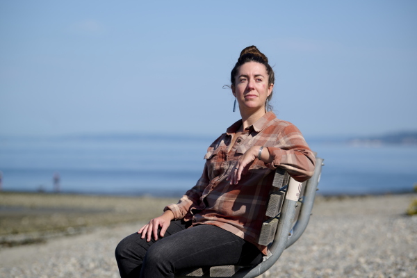 SEATTLE, WA - SEPTEMBER 19, 2025: Jessie Beck, former NOAA fisheries biologist, photographed at Golden Gardens park in Seattle. Meron Menghistab for NPR