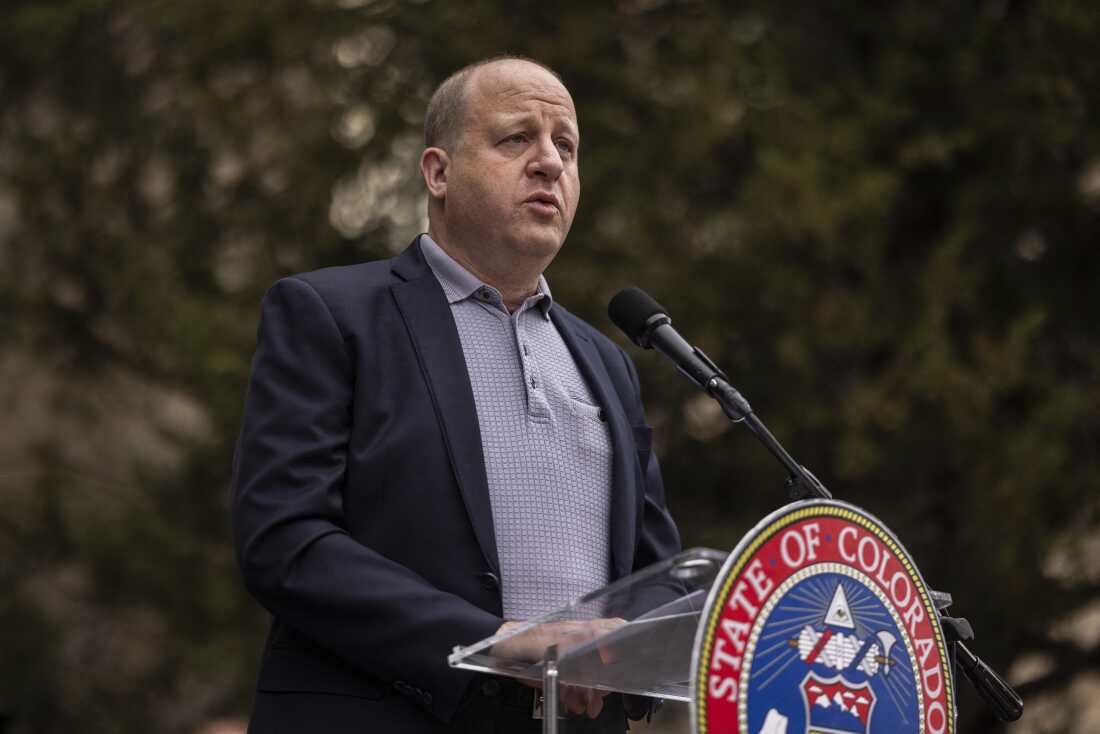 Colorado Gov. Jared Polis speaks during a community gathering at the site of an attack against a group people holding a vigil for kidnapped Israeli citizens in Gaza in Boulder, Colorado on June 4, 2025.