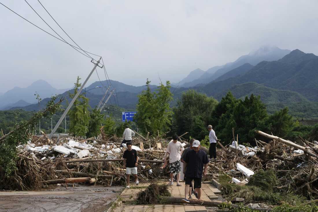 Heavy rains and flooding kill at least 34 people in and near Beijing