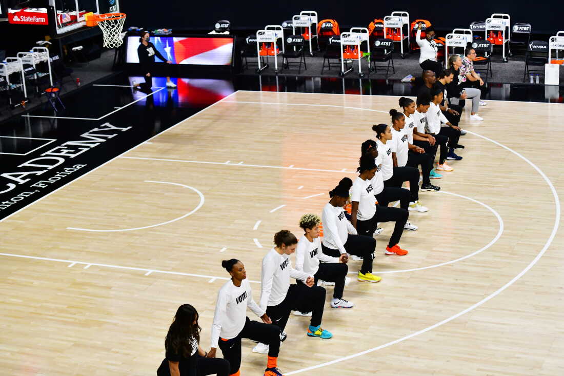 The Connecticut Sun take a knee during the national anthem before Game Four of their Third Round playoff against the Las Vegas Aces at Feld Entertainment Center on Sept. 27, 2020, in Palmetto, Fla.