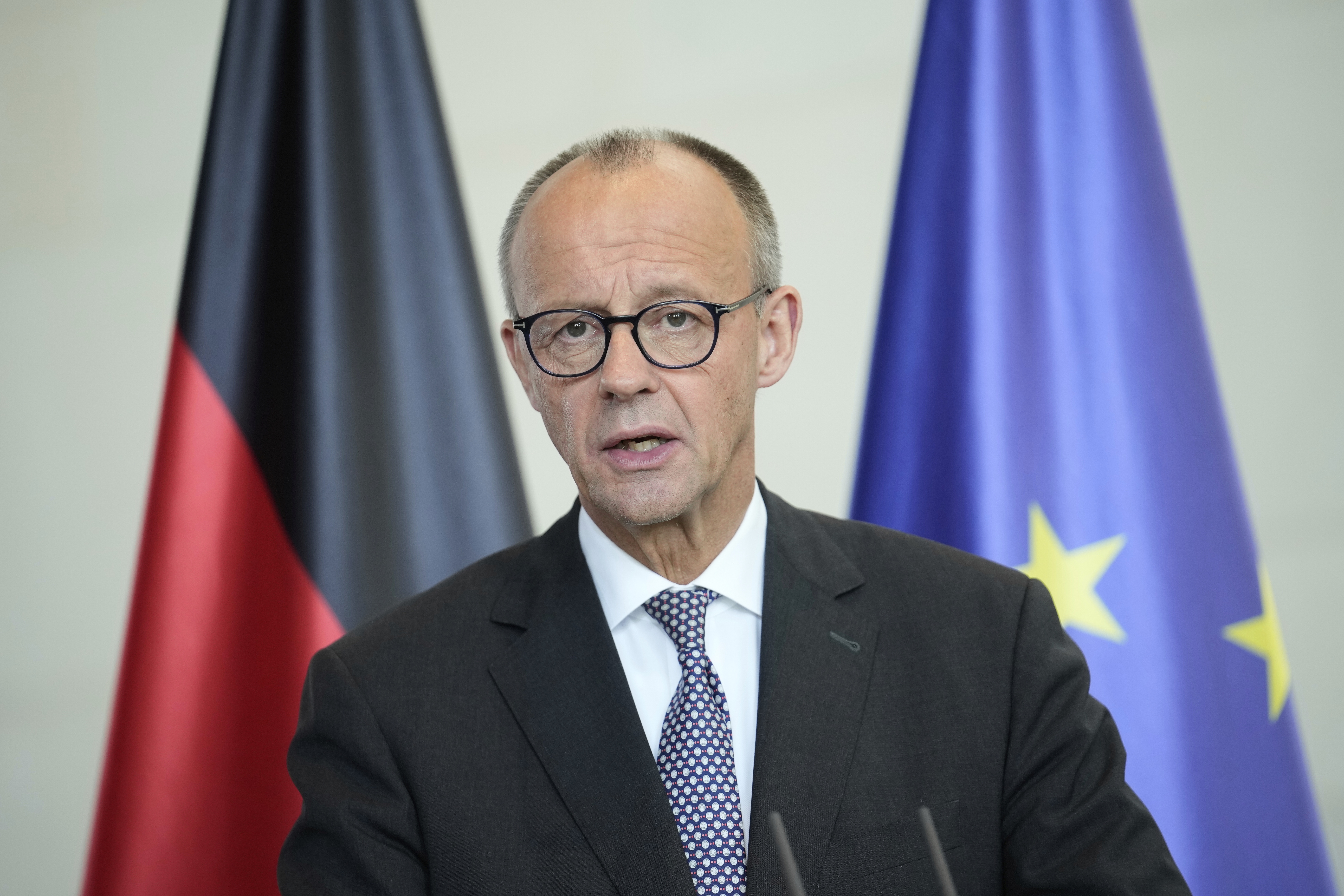 German Chancellor Friedrich Merz attends a news conference after a meeting with Jordan