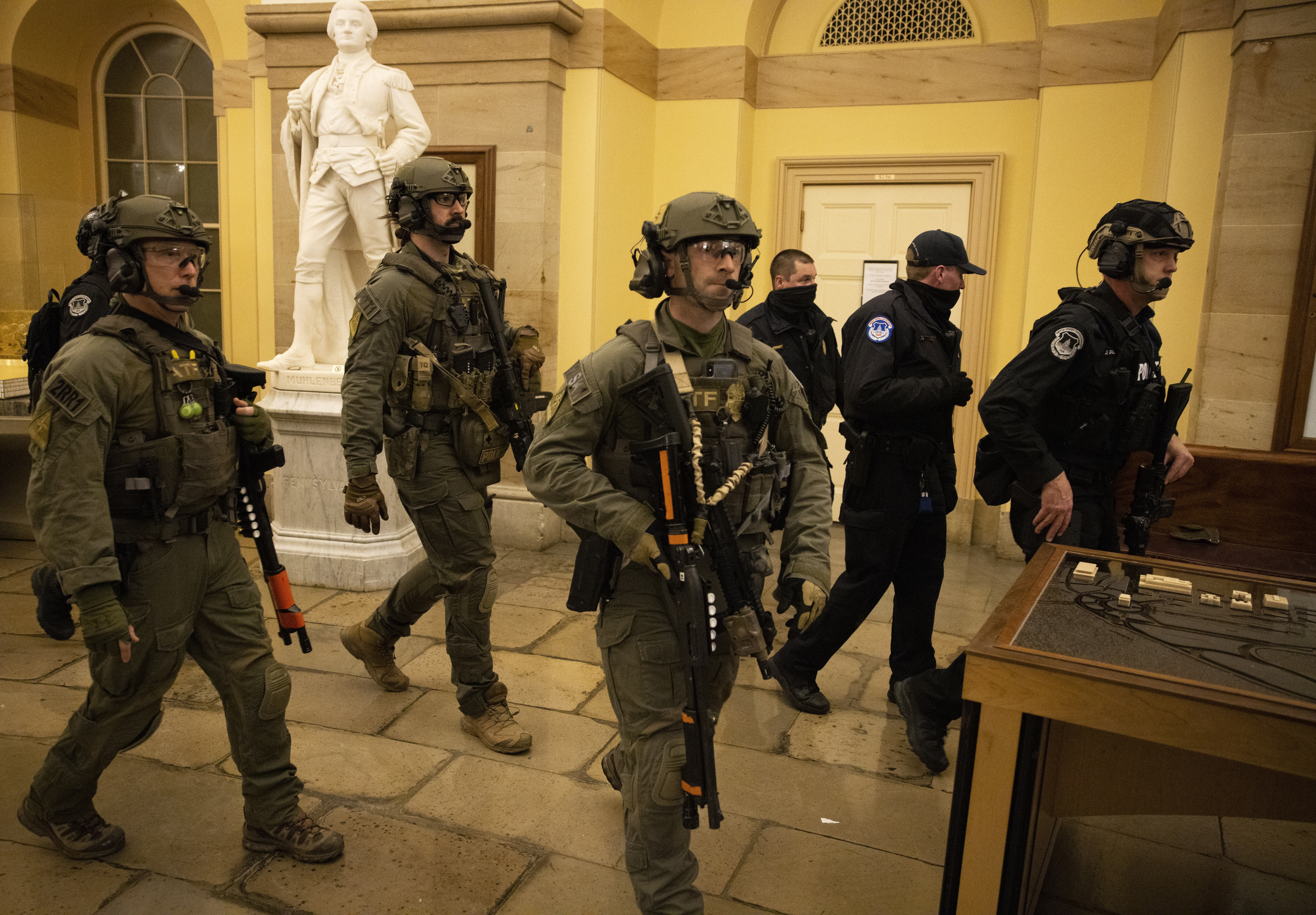 FBI and ATF law enforcement push out supporters of President Trump as they protested inside the U.S. Capitol on January 6, 2021, in Washington, D.C.
