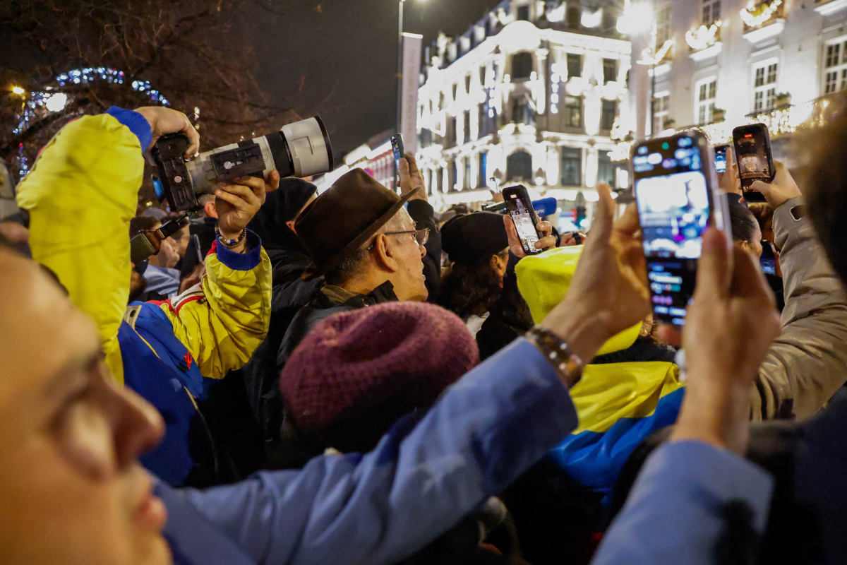 People wait to see Nobel Peace Prize laureate Maria Corina Machado outside the Grand Hotel, in Oslo, Norway, early Thursday, Dec. 11, 2025.
