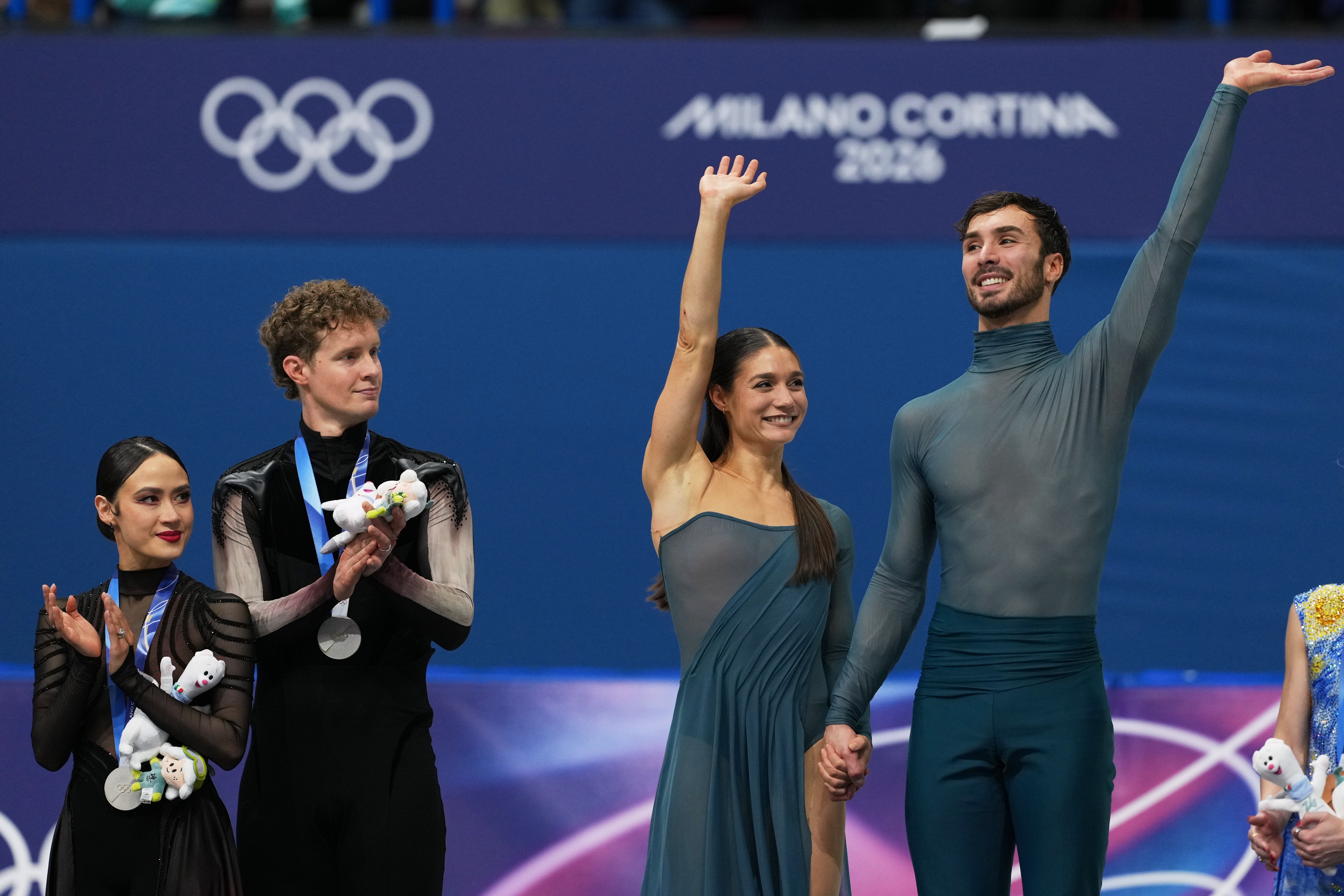 U.S. ice dancers Madison Chock and Evan Bates win Olympic silver, in a stunning upset