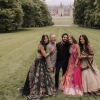From left, Ashna Ahuja, Deepak Ahuja, Akash Mahtani, Shreya Ahuja and Madhu Ahuja attended Mahtani and Shreya Ahuja’s wedding in Asheville, N.C., in 2025.