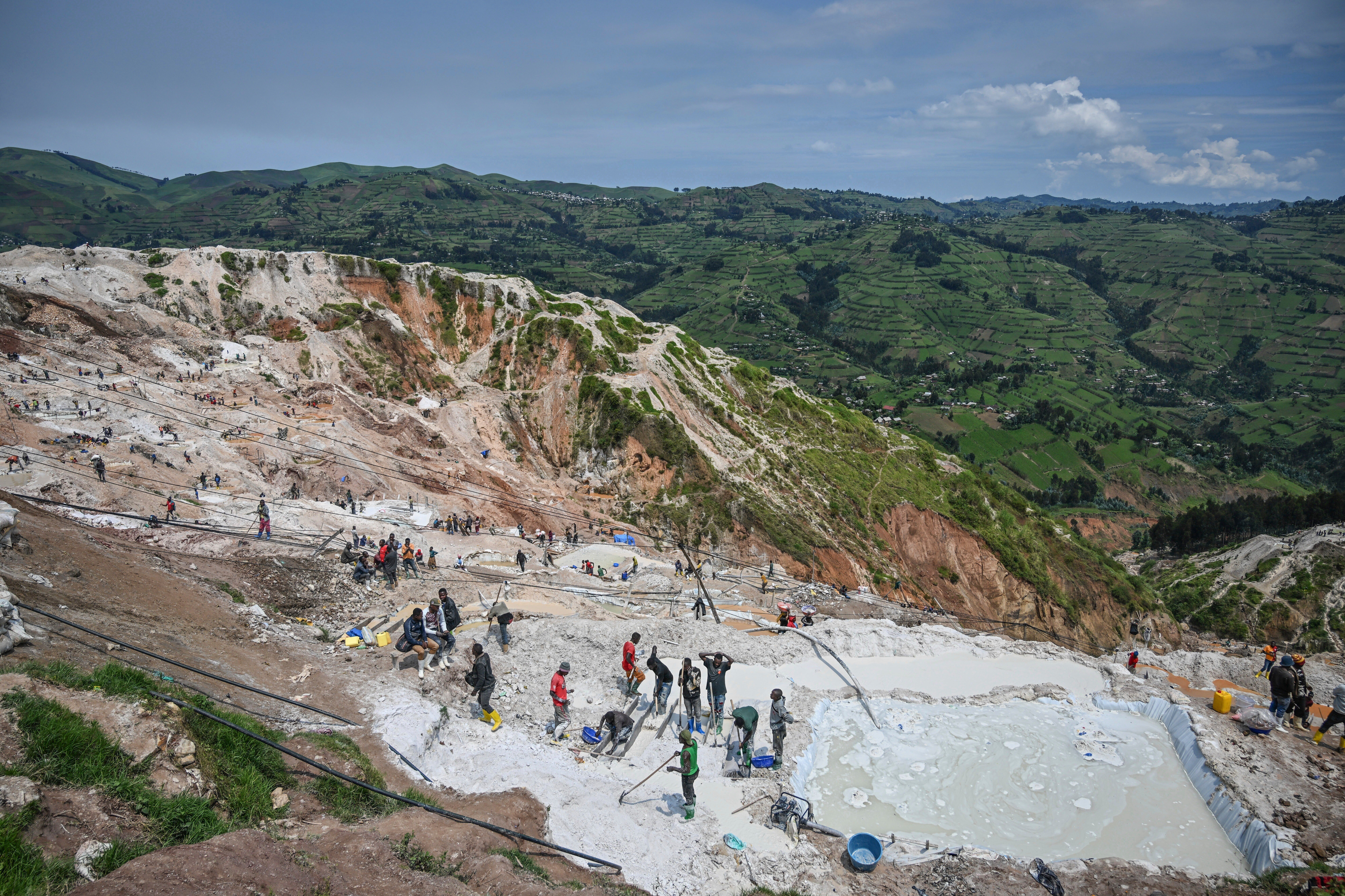 Miners work at a coltan mining quarry in Rubaya, Congo, in May 2025.