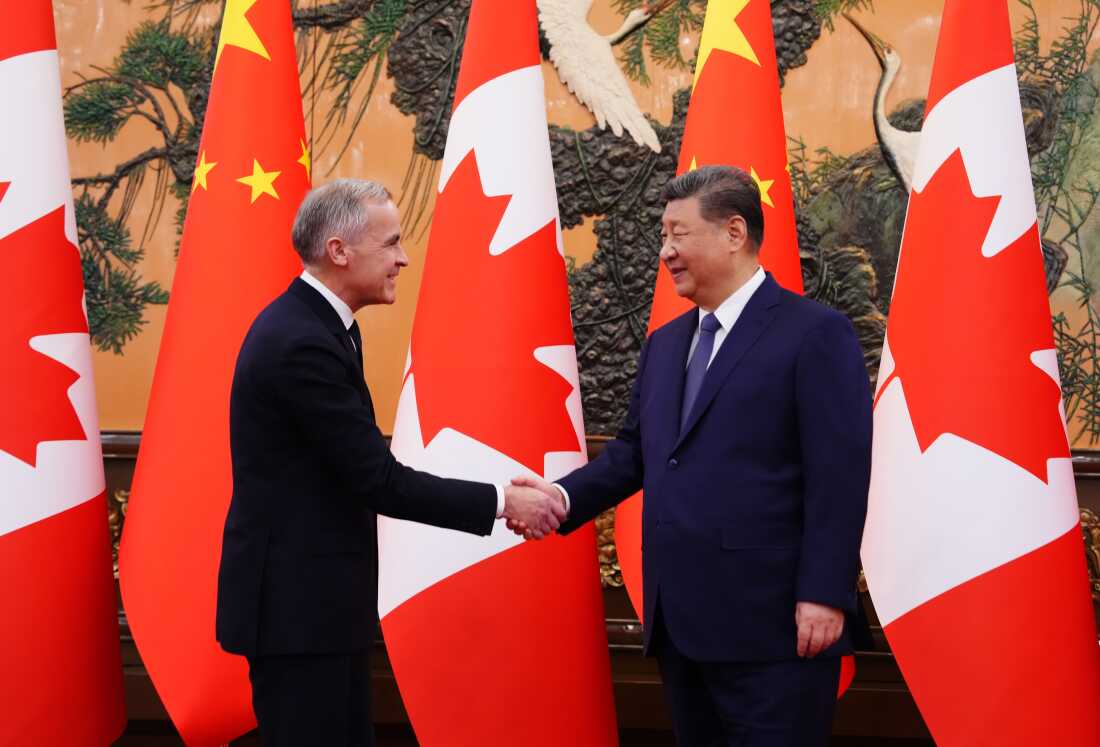 Canada's Prime Minister Mark Carney, left, meets with Chinese President Xi Jinping at the Great Hall of the People in Beijing Friday, Jan. 16, 2026. 