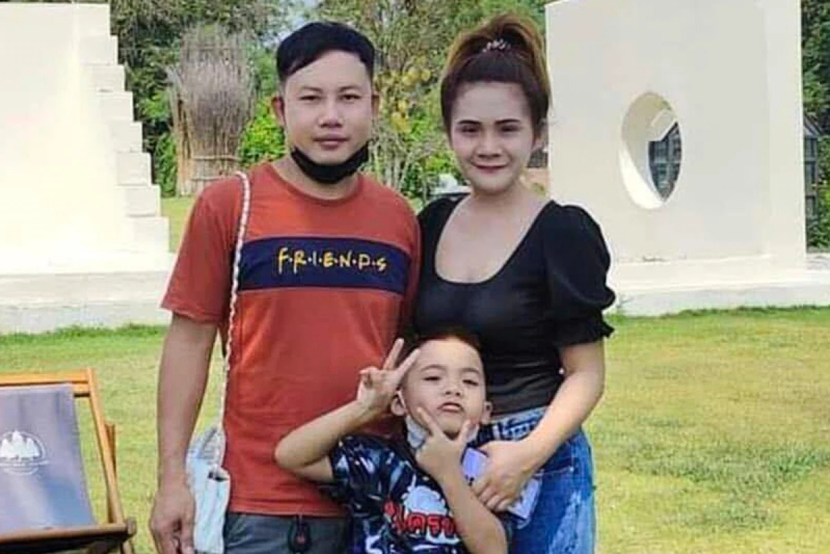 This undated photo provided by the Hostage's Family Forum shows Nattapong Pinta, with his wife and son.