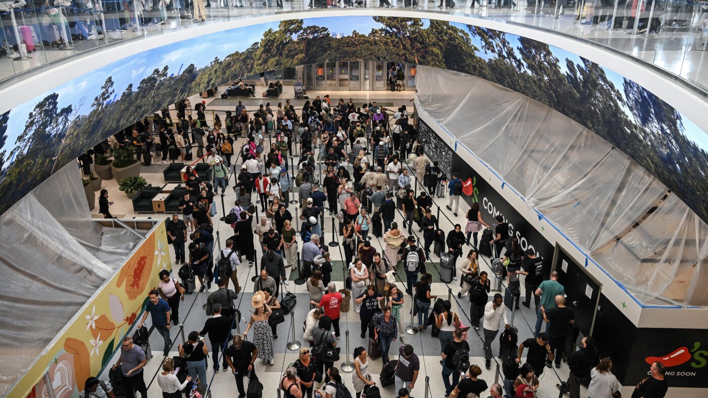 Stuck in a long TSA line? Here are some strategies if you need to rebook your flight