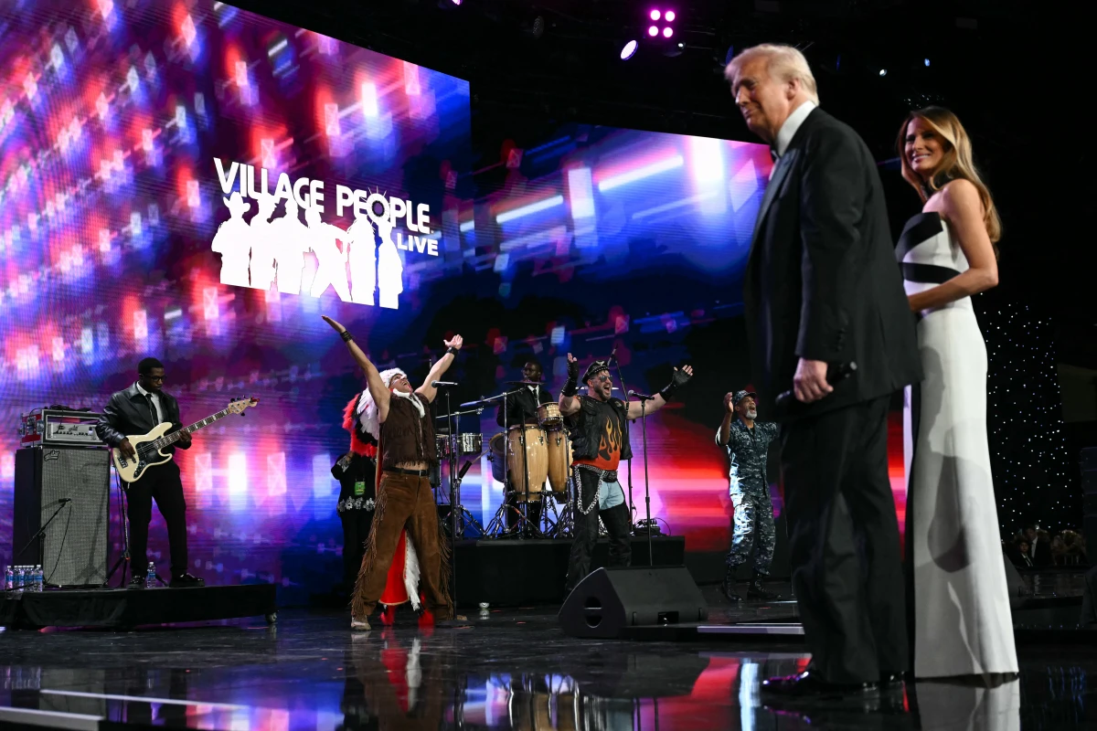 President Trump and First Lady Melania Trump watch as the Village People perform during the Liberty inaugural ball at the Walter E. Washington Convention Center on Monday.