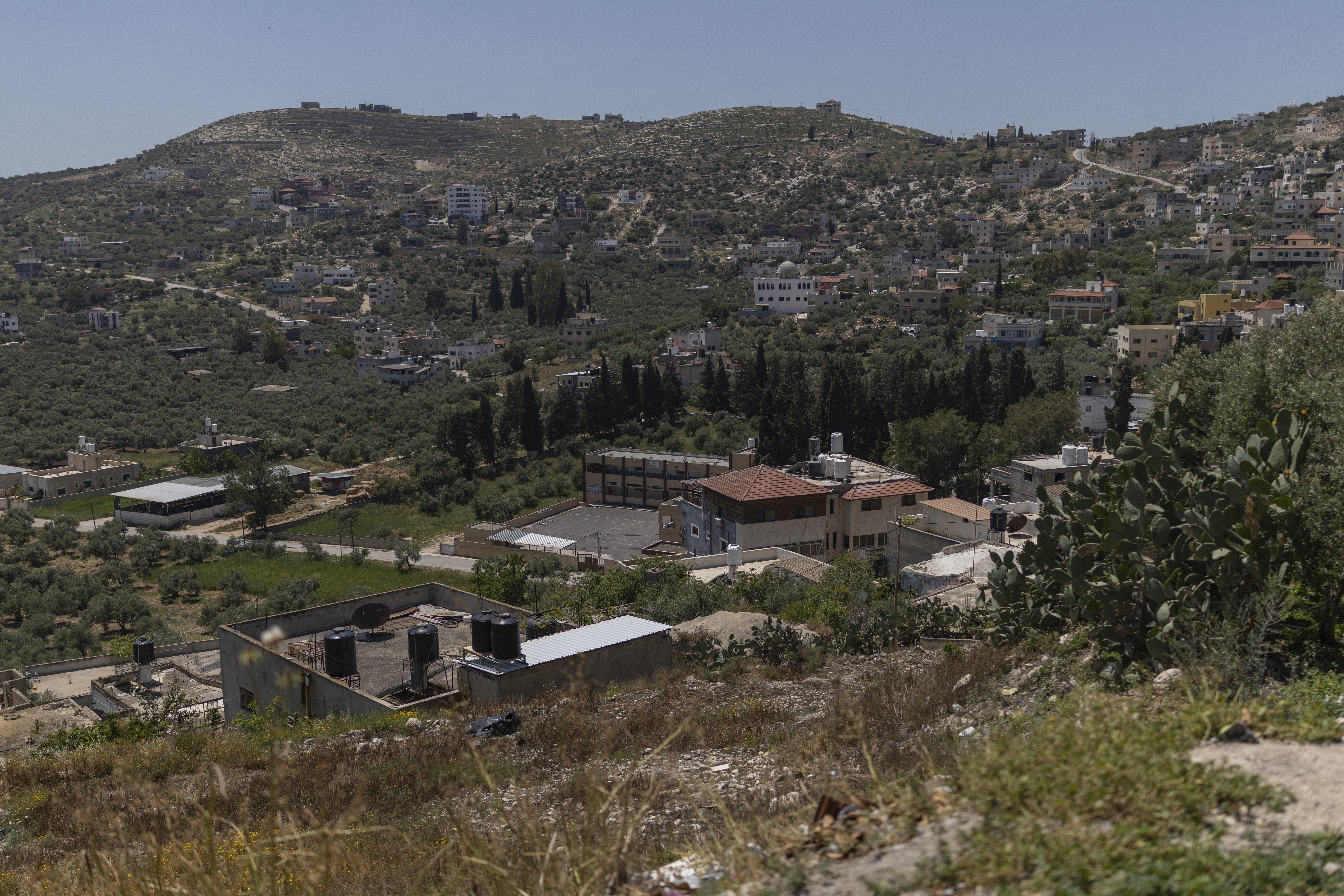 The Sa-Nur settlement is pictured in the south of Jenin, in the Israeli-occupied West Bank on May 7. Nearby, Israeli settlers dug up the grave of an elderly Palestinian man and forced his family to remove his body.