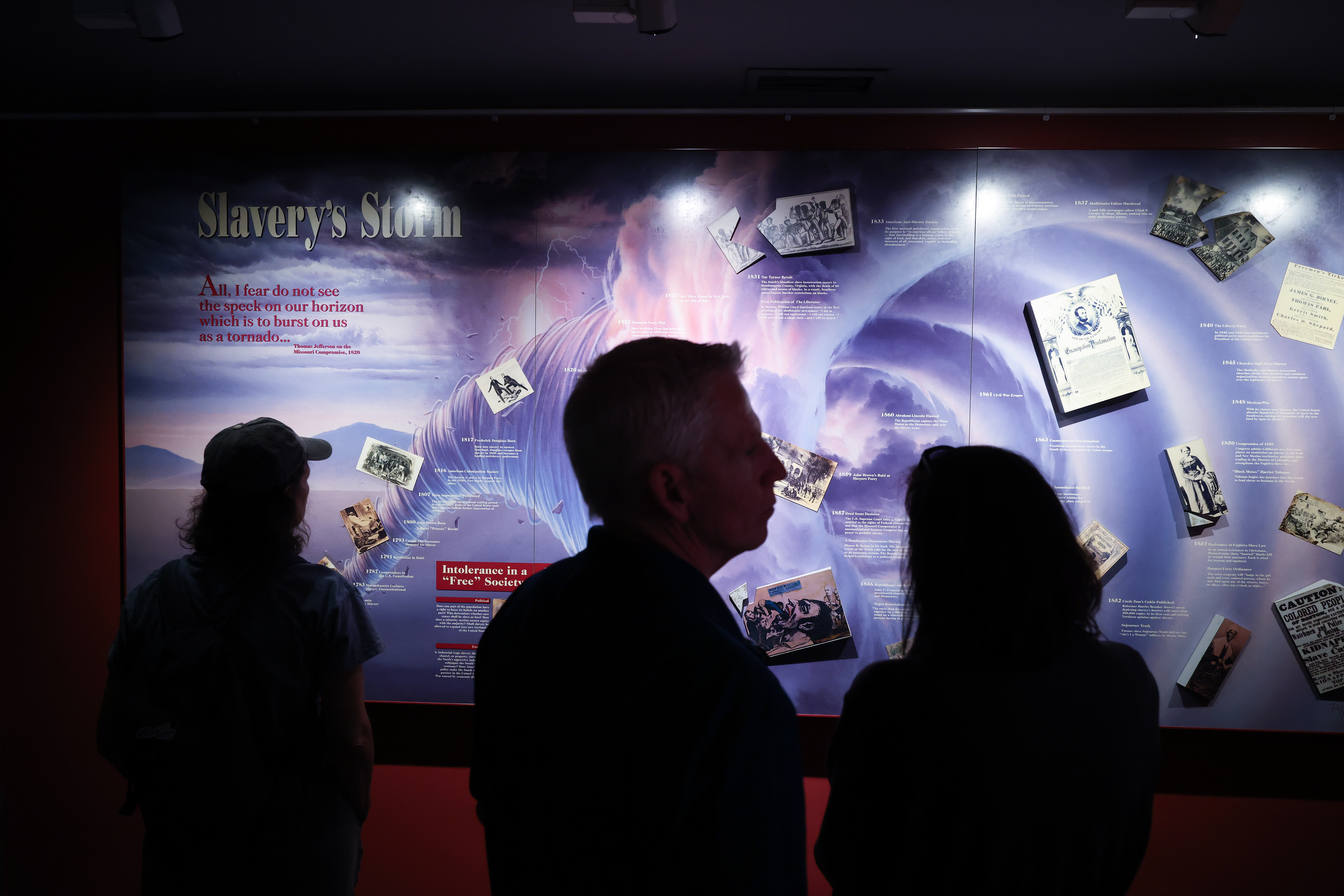 Visitors view exhibits related to slavery at the John Brown Museum at the Harpers Ferry National Historical Park in Harpers Ferry, W. Va. According to Marilyn Jackson, CEO of the American Alliance of Museums, President Trump