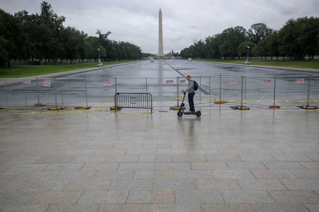 The empty, fenced-off Reflecting Pool as seen in late September.