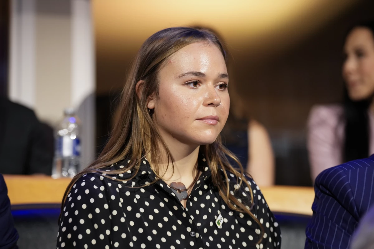 Gov. Tim Walz's daughter, Hope Walz, watches the proceedings during the first day of the Democratic National Convention on Monday in Chicago.