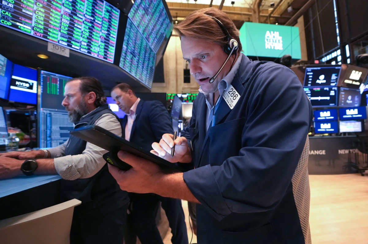 Traders work on the floor of the New York Stock Exchange (NYSE) at the opening bell on May 8, 2025, in New York City. Stocks surged on Monday after China and the U.S. clinched a temporary deal on tariffs.