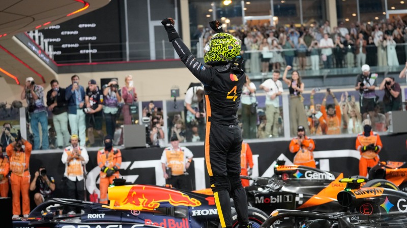 McLaren driver Lando Norris of Britain reacts after becoming a world champion after the Abu Dhabi Formula One Grand Prix in Abu Dhabi, United Arab Emirates, Sunday, Dec. 7, 2025. (