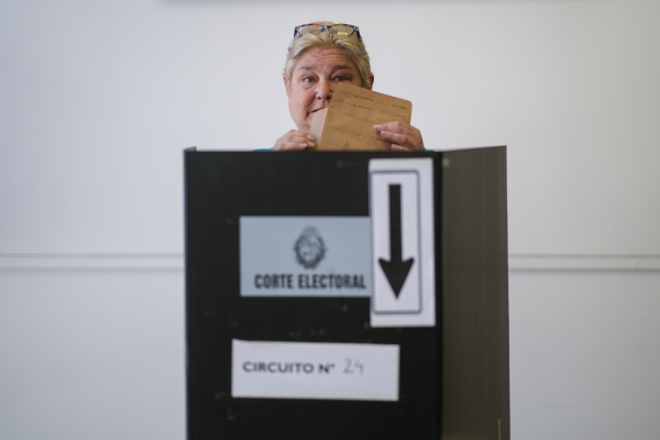 Yeni Varone, a nurse, casts her vote in the presidential run-off election in Montevideo, Uruguay on Sunday.
