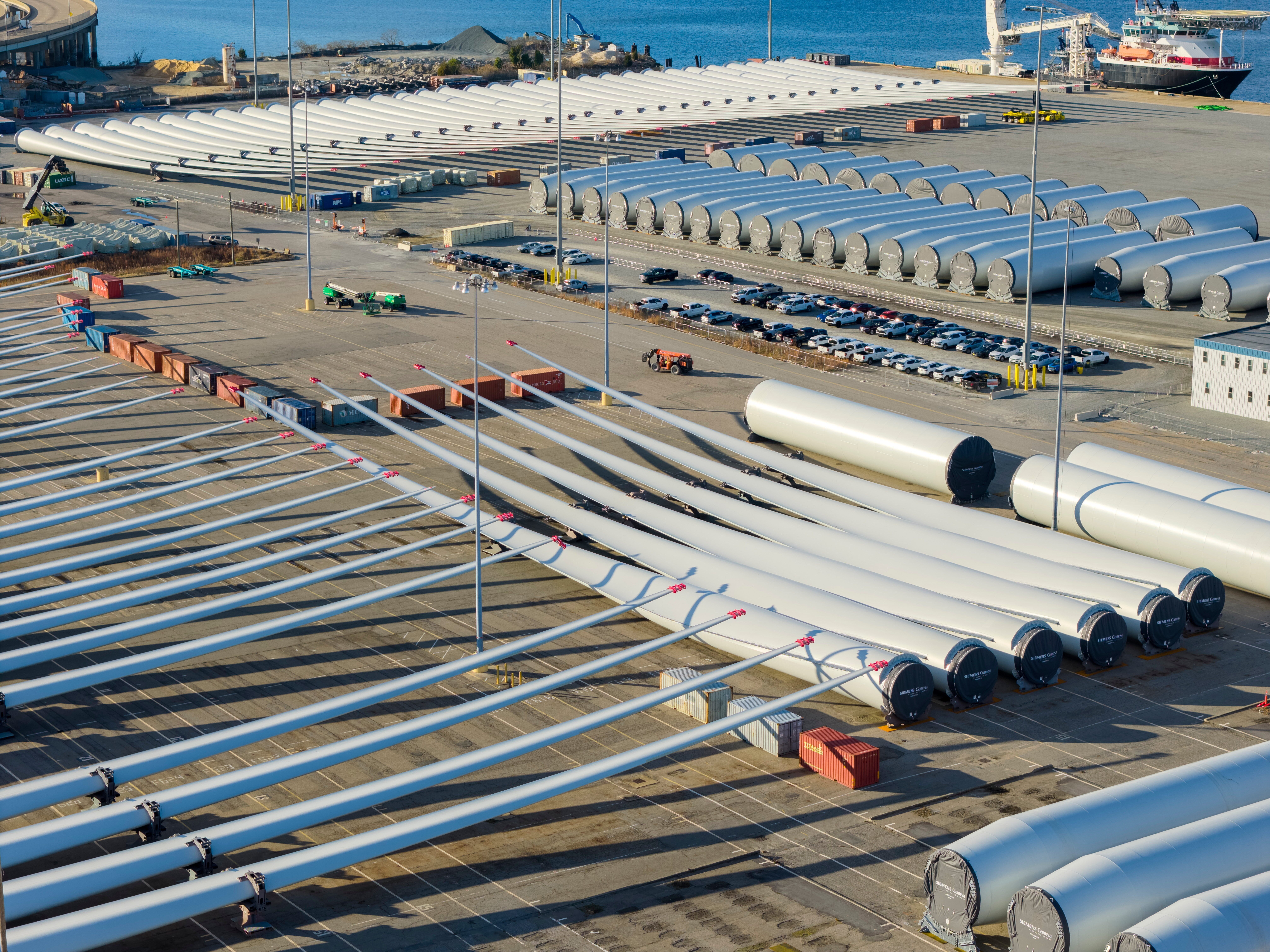 Wind turbine bases, generators and blades sit at The Portsmouth Marine terminal that is the staging area for Dominion Energy Virginia, which is developing Coastal Virginia Offshore Wind, on Dec. 22 in Portsmouth, Va.