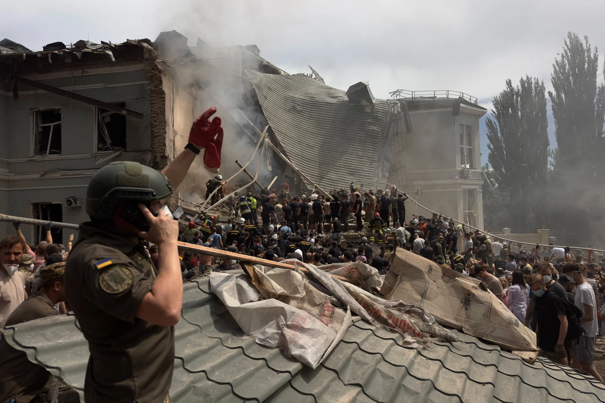 Rescuers clear the rubble of the destroyed Ohmatdyt Children's Hospital following a missile attack in Kyiv on July 8.