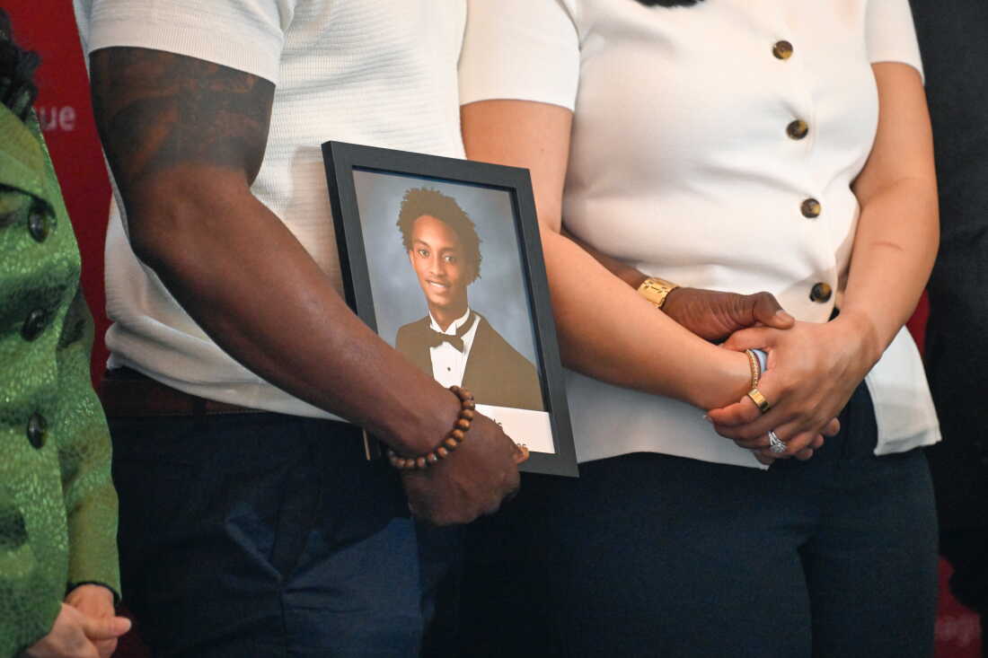 Christine Wonsley and Elmore Wonsley, mother and stepfather of Nolan Wells, stand on a stage with a photo of their son as they appear at the National Urban League's annual conference to share updates on his death on Thursday, July 30, 2026, in Nashville, Tenn.