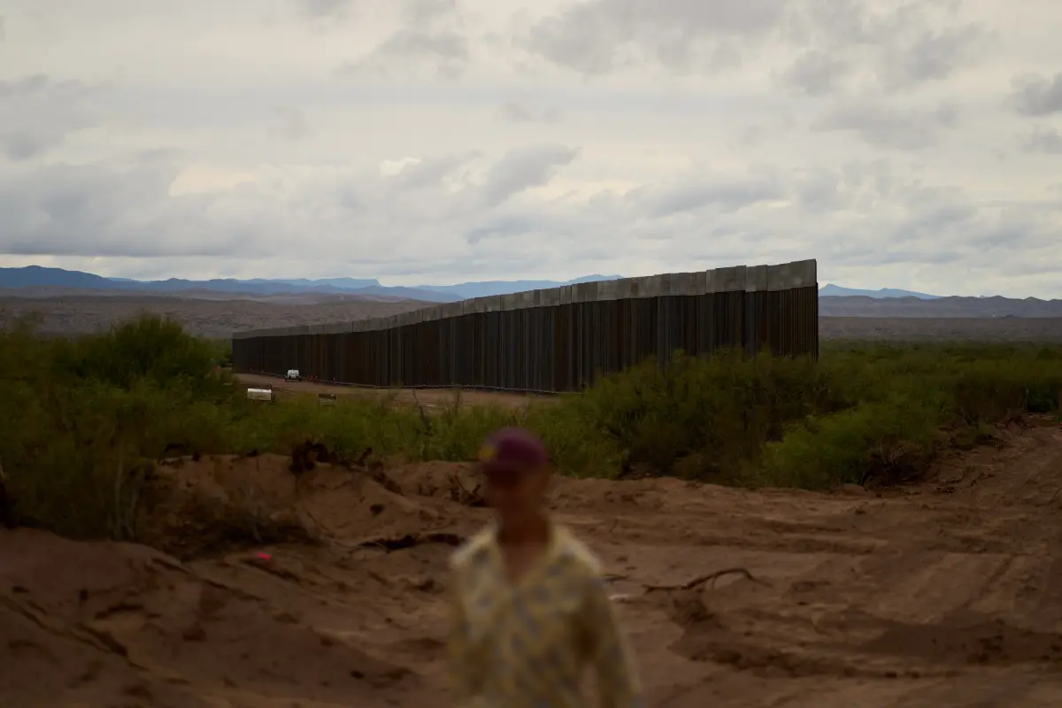 Bill Addington visits a border wall under construction near his property Wednesday, Sept. 23, 2026, near Sierra Blanca, Texas.