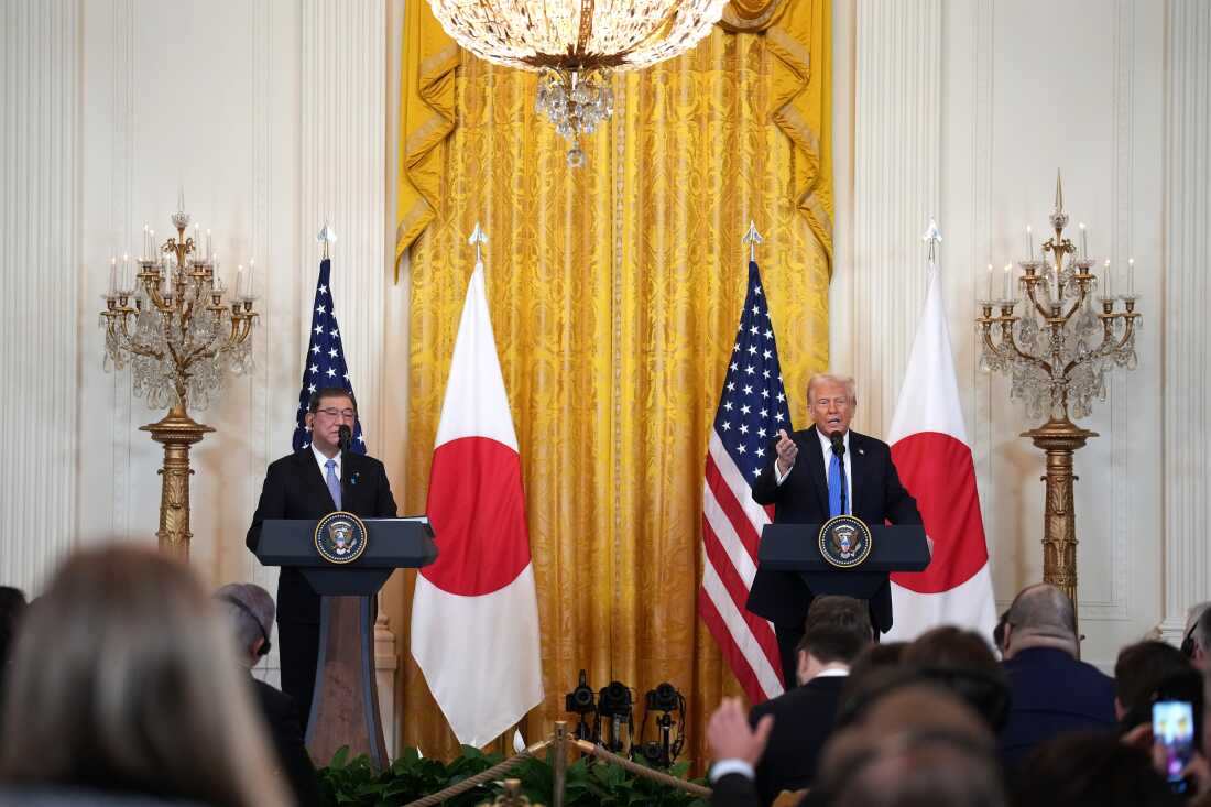 President Trump takes questions from the press alongside Japanese Prime Minister Shigeru Ishiba from the East Room of the White House on Friday.