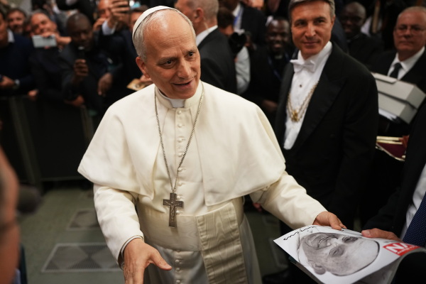 Pope Leo XIV arrives for an audience with thousands of journalists and media workers at Paul VI Hall in Vatican City. The audience with journalists has become a tradition among newly elected popes.