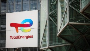 A sign for the French company TotalEnergies is displayed at headquarters March 212025in La Defense business district outside of Paris.