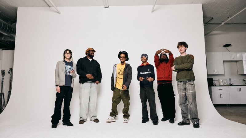 MIKE (second from left) and Earl Sweatshirt (third from left) with the members of Surf Gang, the New York-based collective who produced the rappers' new double album, Pompeii // Utility.