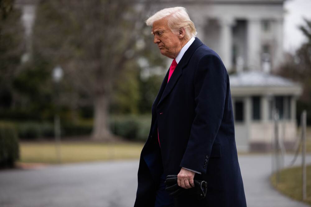 President Trump walks to the Residence after arriving to the White House on Feb. 22. The administration is facing legal challenges over its effort to freeze payments for federal grants and other programs. (Getty Images)