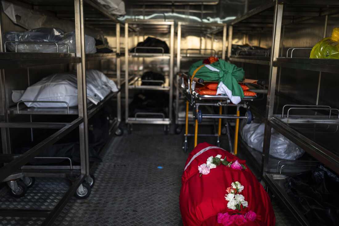 Nabatiyeh, Lebanon — May 13, 2026. The bodies of Lebanese Civil Defense members Hussein Jaber and Ahmad Noura, who were killed in an Israeli strike on the southern town of Nabatieh on May 12, 2026, in the morgue. Diego Ibarra Sánchez for NPR.