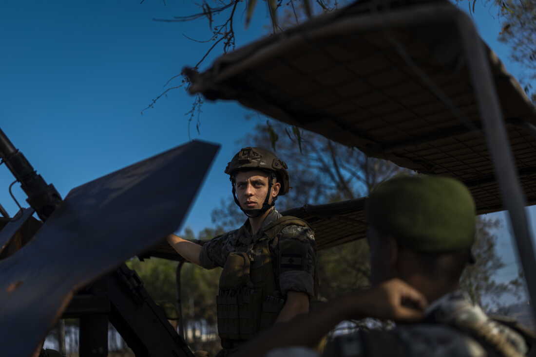 On July 22, 2026, Lebanese Army soldiers monitor the entrance to Zawtar al-Gharbieh, where residents are cautiously returning after months of displacement. Following the conflict with Israel, the LAF has redeployed across southern Lebanon as part of efforts to restore state authority in areas long contested by Hezbollah under a U.S.-brokered trilateral framework with Israel and the United States.