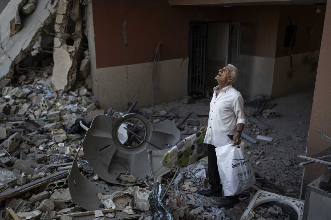 Najib Ayyad checks his apartment in Nabatieh, heavily damaged and likely to be demolished. “It was my life’s work to own this apartment,” he says. Now staying at his daughter’s home in Beirut, he has returned to salvage what remains for his children. The apartment overlooks Beaufort Castle, a national symbol of deep personal meaning for him, now occupied by Israeli forces.