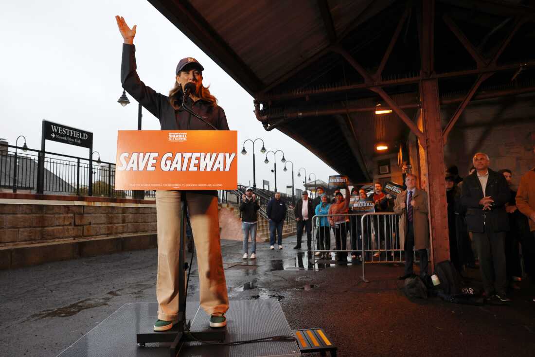 Mikie Sherrill, then a congressional lawmaker running for New Jersey governor, speaks to commuters at a train station where she addressed the Gateway Tunnel Project on Oct. 30, 2025 in Westfield, N.J.