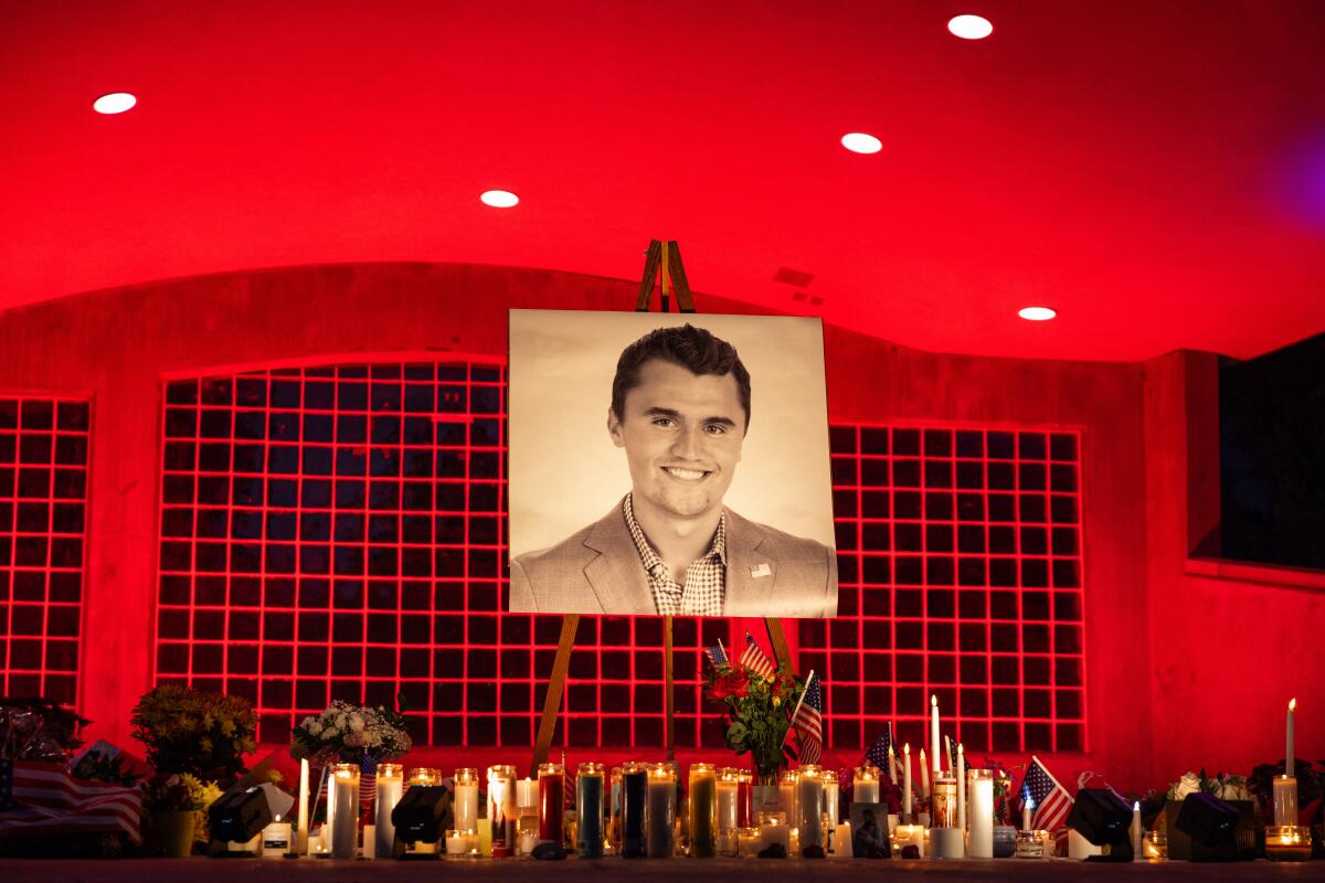 A photo of Charlie Kirk, 31, is seen at his makeshift memorial at Orem City Center Park in Orem, Utah, a day after he was shot during a public event at Utah Valley University on Sept. 11, 2025.