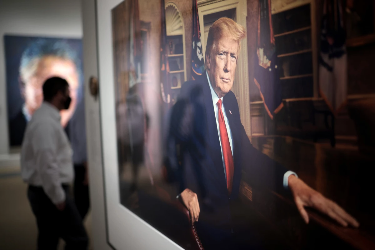 Patrons view a portrait of President Trump in the America's Presidents exhibition at the National Portrait Gallery on May 14, 2021 in Washington, DC.