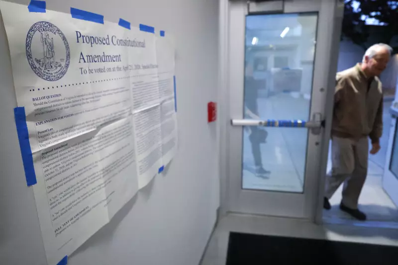 Voters arrive Tuesday before casting their ballots at a polling location in Arlington, Va.